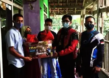 Komunitas Honda BeAT Jakarta Salurkan Bantuan