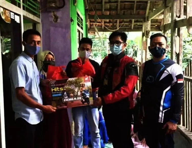 Komunitas Honda BeAT Jakarta Salurkan Bantuan