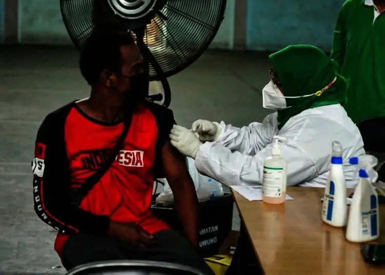 Potret Vaksinasi Covid-19 Tingkat RW di Kota Tangerang