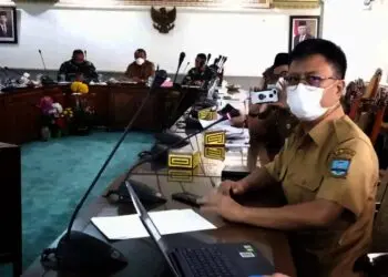 Kepala Dinkes Kabupaten Serang, Agus Sukmayadi, saat menghadiri rakor pembahasan penanganan Covid-19. (ISTIMEWA)