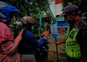 Potret Penerapan Aplikasi PeduliLindungi di Pasar Tradisional