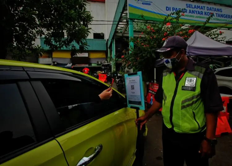 Potret Penerapan Aplikasi PeduliLindungi di Pasar Tradisional