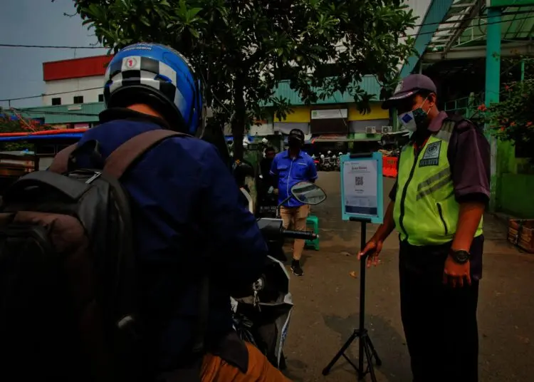 Potret Penerapan Aplikasi PeduliLindungi di Pasar Tradisional