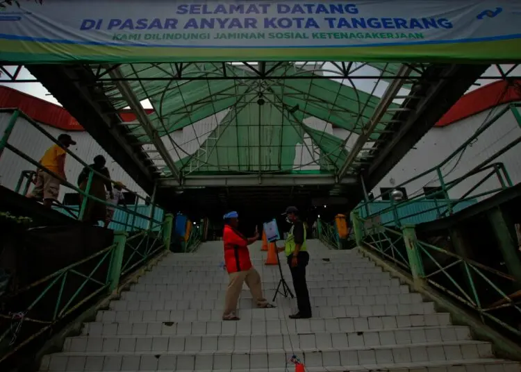 Potret Penerapan Aplikasi PeduliLindungi di Pasar Tradisional