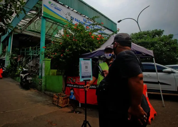 Potret Penerapan Aplikasi PeduliLindungi di Pasar Tradisional