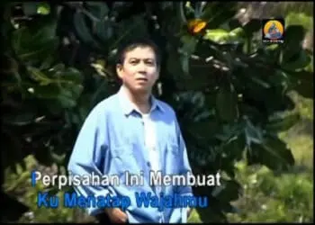 Lirik Lagu Disini Dibatas Kota ini - Tommy J Pisa