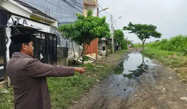 Fasos Fasum Belum Diserahkan ke Pemerintah, Jalan Perumahan Garden City Periuk Mirip Kubangan