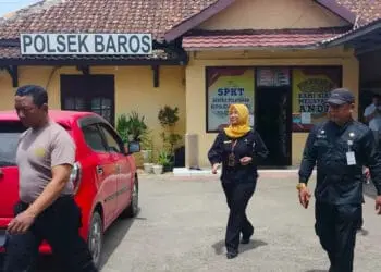 MAPOLSEK BAROS–Mapolsek Baros yang berlokasi tepat di dekat Pasar Baros, akan direlokasi dekat kantor Kecamatan setempat. Hal itu dilakukan, lantaran lahan eks Mapolsek tersebut akan digunakan untuk lahan parkir pasar, Selasa (7/2/2023). (SIDIK/SATELITNEWS.COM)