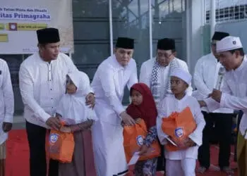 UPG Santuni anak Yatim, dan bagikan paket sembako, Senin (17/4/2023). (SIDIK/SATELITNEWS.COM)