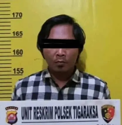DIAMANKAN: Seorang pria bernama Ramdani (34) asal Poris Plawad, Cipondoh, Kota Tangerang dibekuk Kepolisian Resort Kota Tangerang, karena diduga membawa sajam dimuka umum. (ISTIMEWA)