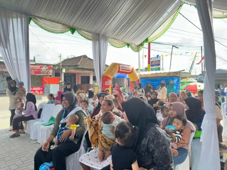 Alfamart bersama Baby Happy, kolaborasi dalam program Alfamart Sahabat Posyandu, yang digelar di 34 kota di Indonesia, Kamis (12/2/2026). (ISTIMEWA)
