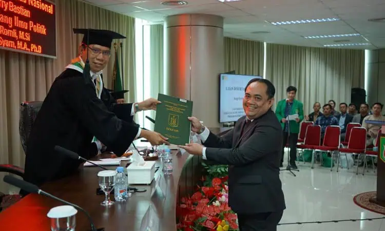 Teliti Pilkada Calon Tunggal Kota Tangerang, Dekan FEB UNIS Raih Doktor Ilmu Politik