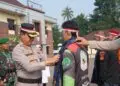 APEL BESAR -- Apel Besar Sabuk Kamtibmas dan Pam Swakarsa, yang digelar di Lapangan Mapolres Pandeglang, Kamis (27/8/2026). (ISTIMEWA)