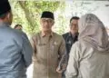 BERI KETERANGAN -- Bupati Lebak, Hasbi Asyidiki Jayabaya di dampingi para pejabat saat akan menghadiri rapat paripurna pembahasan Raperda Perubahan APBD 2026 di DPRD Lebak, Kamis (10/9/2026). (MULYANA/SATELITNEWS.COM)