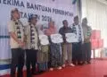 SERAH TERIMA BANTUAN -- Kodim 0601/Pandeglang hadiri acara serah terima bantuan KKP untuk masyarakat pesisir, di Kampung Nelayan Merah Putih (KNMP), Kampung Muara Dua, Desa Cikiruhwetan, Kecamatan Cikeusik, Kabupaten Pandeglang. (ISTIMEWA)