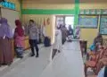 Polisi Awasi Penyaluran Beras Bantuan di Rangkasbitung