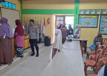 Polisi Awasi Penyaluran Beras Bantuan di Rangkasbitung